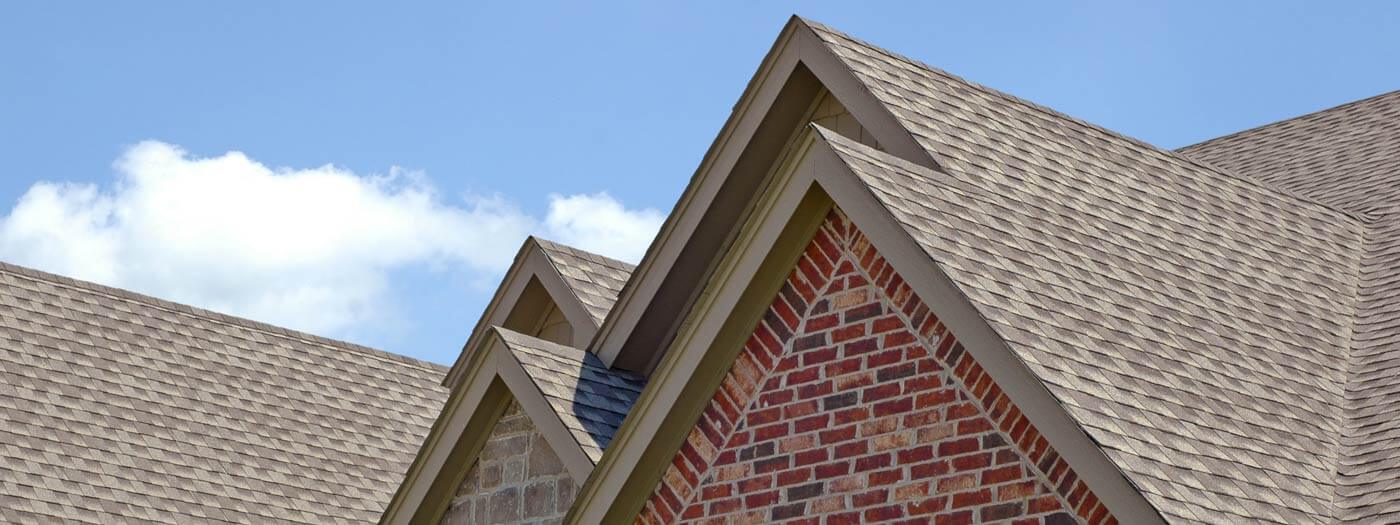 brick house with pointed roof